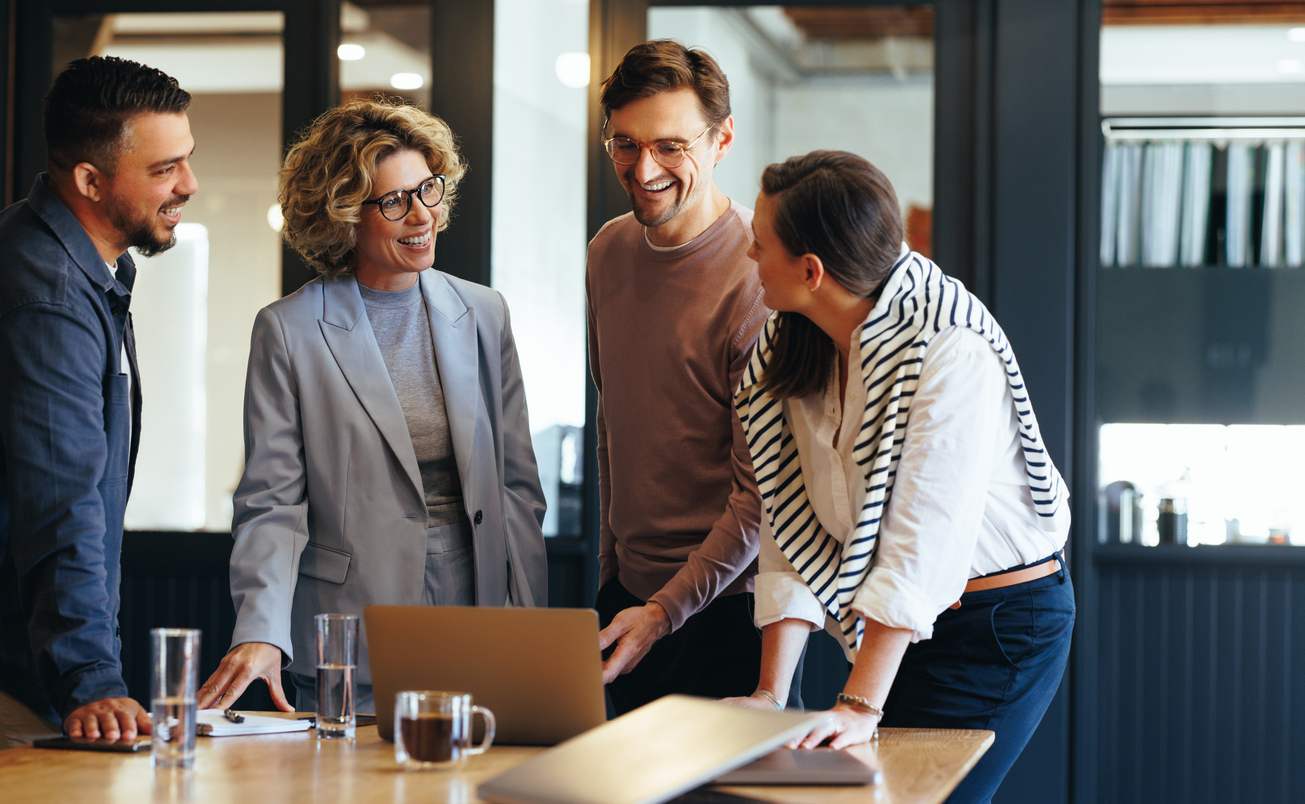 Group of Business people having a meeting in a tech company. Creative business professionals planning a project in an office. Teamwork and collaboration in a modern workplace. The Valley List offers White Label design in Parkersburg, WV.