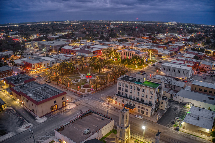 An aerial view of Seguin Texas at dusk. The Valley List is a affordable website design company in Seguin, Texas.