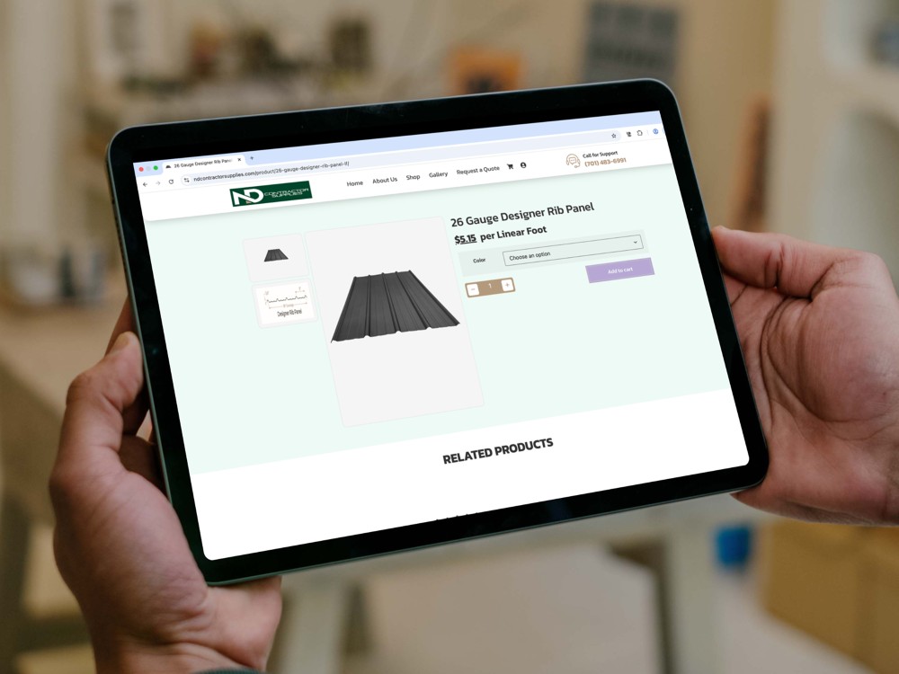 A person uses the ND contractor supplies website, created by The Valley List with WooCommerce.