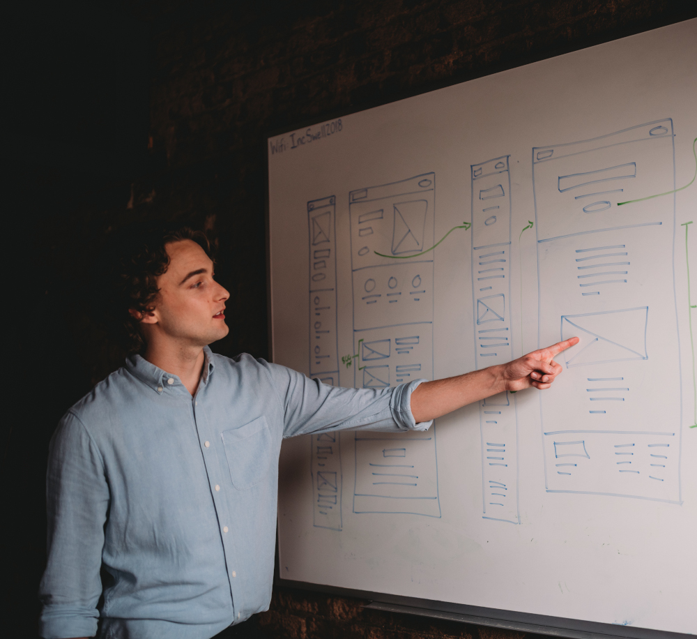 Carson with The Valley List strategizing design with the team.